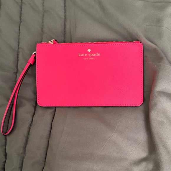 kate spade Handbags - kate spade Hot Pink Wristlet Pouch with Gold Logo